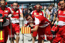 Ferrari mechanics in the pits. 26.07.2013. Formula 1 World Championship, Rd 10, Hungarian Grand Prix, Budapest, Hungary, Practice Day