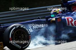 Jean-Eric Vergne (FRA) Scuderia Toro Rosso STR8 locks up under braking. 26.07.2013. Formula 1 World Championship, Rd 10, Hungarian Grand Prix, Budapest, Hungary, Practice Day