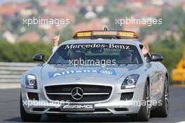 (L to R): Herbie Blash (GBR) FIA Delegate and Charlie Whiting (GBR) FIA Delegate in the FIA Safety Car. 26.07.2013. Formula 1 World Championship, Rd 10, Hungarian Grand Prix, Budapest, Hungary, Practice Day