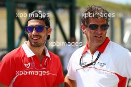 (L to R): Tio Ellinas (CYP) Marussia Manor Racing GP3 Driver with Graeme Lowdon (GBR) Marussia F1 Team Chief Executive Officer. 26.07.2013. Formula 1 World Championship, Rd 10, Hungarian Grand Prix, Budapest, Hungary, Practice Day