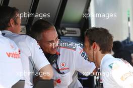 (L to R): Sam Michael (AUS) McLaren Sporting Director with Martin Whitmarsh (GBR) McLaren Chief Executive Officer and Jenson Button (GBR) McLaren. 26.07.2013. Formula 1 World Championship, Rd 10, Hungarian Grand Prix, Budapest, Hungary, Practice Day