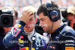 Sebastian Vettel (GER) Red Bull Racing RB9 with Guillaume Rocquelin (ITA) Red Bull Racing Race Engineer on the grid. 28.07.2013. Formula 1 World Championship, Rd 10, Hungarian Grand Prix, Budapest, Hungary, Race Day