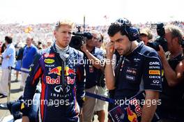 Sebastian Vettel (GER) Red Bull Racing with Guillaume Rocquelin (ITA) Red Bull Racing Race Engineer on the grid. 28.07.2013. Formula 1 World Championship, Rd 10, Hungarian Grand Prix, Budapest, Hungary, Race Day