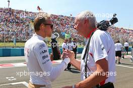 (L to R): Max Chilton (GBR) Marussia F1 Team with John Booth (GBR) Marussia F1 Team Team Principal on the grid. 28.07.2013. Formula 1 World Championship, Rd 10, Hungarian Grand Prix, Budapest, Hungary, Race Day