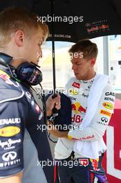 Sebastian Vettel (GER) Red Bull Racing with Heikki Huovinen (FIN) Personal Trainer on the grid. 28.07.2013. Formula 1 World Championship, Rd 10, Hungarian Grand Prix, Budapest, Hungary, Race Day