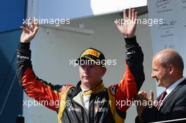 Kimi Raikkonen (FIN) Lotus F1 Team celebrates his second position on the podium. 28.07.2013. Formula 1 World Championship, Rd 10, Hungarian Grand Prix, Budapest, Hungary, Race Day