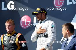 Race winner Lewis Hamilton (GBR) Mercedes AMG F1 celebrates on the podium. 28.07.2013. Formula 1 World Championship, Rd 10, Hungarian Grand Prix, Budapest, Hungary, Race Day