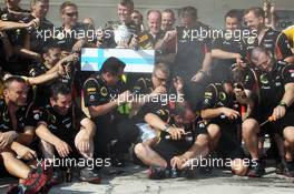 Kimi Raikkonen (FIN) Lotus F1 Team celebrates his second position with the team, who spray team edition Sure / Rexona deodorant. 28.07.2013. Formula 1 World Championship, Rd 10, Hungarian Grand Prix, Budapest, Hungary, Race Day