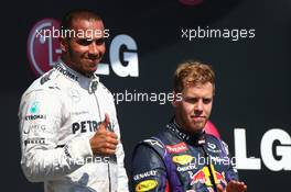 Lewis Hamilton (GBR) Mercedes AMG F1 and Sebastian Vettel (GER) Red Bull Racing. 28.07.2013. Formula 1 World Championship, Rd 10, Hungarian Grand Prix, Budapest, Hungary, Race Day
