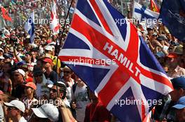 A flag for Lewis Hamilton (GBR) Mercedes AMG F1 with the fans at the podium. 28.07.2013. Formula 1 World Championship, Rd 10, Hungarian Grand Prix, Budapest, Hungary, Race Day