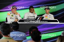 The FIA Press Conference (L to R): Kimi Raikkonen (FIN) Lotus F1 Team, second; Lewis Hamilton (GBR) Mercedes AMG F1, race winner; Sebastian Vettel (GER) Red Bull Racing, third. 28.07.2013. Formula 1 World Championship, Rd 10, Hungarian Grand Prix, Budapest, Hungary, Race Day