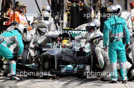 Lewis Hamilton (GBR) Mercedes AMG F1 W04 makes a pit stop. 28.07.2013. Formula 1 World Championship, Rd 10, Hungarian Grand Prix, Budapest, Hungary, Race Day