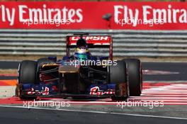 Jean-Eric Vergne (FRA) Scuderia Toro Rosso STR8 runs wide. 28.07.2013. Formula 1 World Championship, Rd 10, Hungarian Grand Prix, Budapest, Hungary, Race Day
