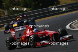 Fernando Alonso (ESP) Ferrari F138 leads Mark Webber (AUS) Red Bull Racing RB9. 28.07.2013. Formula 1 World Championship, Rd 10, Hungarian Grand Prix, Budapest, Hungary, Race Day