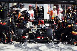 Kimi Raikkonen (FIN) Lotus F1 E21 makes a pit stop. 28.07.2013. Formula 1 World Championship, Rd 10, Hungarian Grand Prix, Budapest, Hungary, Race Day