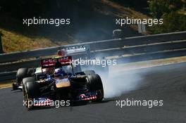 Daniel Ricciardo (AUS) Scuderia Toro Rosso STR8 locks up under braking. 28.07.2013. Formula 1 World Championship, Rd 10, Hungarian Grand Prix, Budapest, Hungary, Race Day