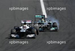 Pastor Maldonado (VEN), Williams F1 Team and Nico Rosberg (GER), Mercedes GP  28.07.2013. Formula 1 World Championship, Rd 10, Hungarian Grand Prix, Budapest, Hungary, Race Day
