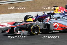 Jenson Button (GBR), McLaren Mercedes and Sebastian Vettel (GER), Red Bull Racing  28.07.2013. Formula 1 World Championship, Rd 10, Hungarian Grand Prix, Budapest, Hungary, Race Day