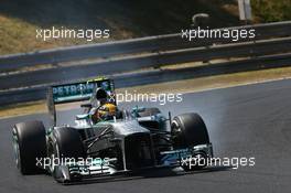 Lewis Hamilton (GBR) Mercedes AMG F1 W04 locks up under braking. 28.07.2013. Formula 1 World Championship, Rd 10, Hungarian Grand Prix, Budapest, Hungary, Race Day