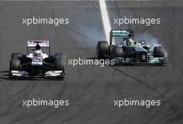Pastor Maldonado (VEN), Williams F1 Team and Nico Rosberg (GER), Mercedes GP  28.07.2013. Formula 1 World Championship, Rd 10, Hungarian Grand Prix, Budapest, Hungary, Race Day