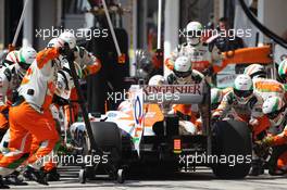 Paul di Resta (GBR) Sahara Force India VJM06 makes a pit stop. 28.07.2013. Formula 1 World Championship, Rd 10, Hungarian Grand Prix, Budapest, Hungary, Race Day