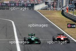 Jules Bianchi (FRA), Marussia Formula One Team  and Charles Pic (FRA), Catheram Formula One Team  28.07.2013. Formula 1 World Championship, Rd 10, Hungarian Grand Prix, Budapest, Hungary, Race Day