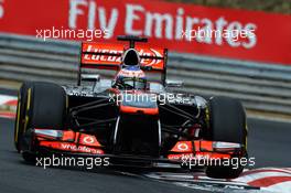 Jenson Button (GBR) McLaren MP4-28. 27.07.2013. Formula 1 World Championship, Rd 10, Hungarian Grand Prix, Budapest, Hungary, Qualifying Day