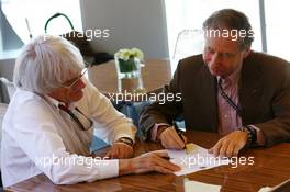 (L to R): Bernie Ecclestone (GBR) CEO Formula One Group (FOM) an Jean Todt (FRA) FIA President sign an agreement setting out a framework for the new Concorde Agreement. 27.07.2013. Formula 1 World Championship, Rd 10, Hungarian Grand Prix, Budapest, Hungary, Qualifying Day