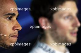 Lewis Hamilton (GBR) Mercedes AMG F1 and Romain Grosjean (FRA) Lotus F1 Team in the FIA Press Conference. 27.07.2013. Formula 1 World Championship, Rd 10, Hungarian Grand Prix, Budapest, Hungary, Qualifying Day