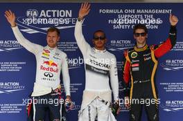 Pole for Lewis Hamilton (GBR) Mercedes AMG F1, 2nd Sebastian Vettel (GER) Red Bull Racing and 3rd Romain Grosjean (FRA) Lotus F1 E21. 27.07.2013. Formula 1 World Championship, Rd 10, Hungarian Grand Prix, Budapest, Hungary, Qualifying Day