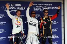 The top three qualifiers in Parc Ferme (L to R): Sebastian Vettel (GER) Red Bull Racing, second; Lewis Hamilton (GBR) Mercedes AMG F1, pole position; Romain Grosjean (FRA) Lotus F1 Team, third. 27.07.2013. Formula 1 World Championship, Rd 10, Hungarian Grand Prix, Budapest, Hungary, Qualifying Day