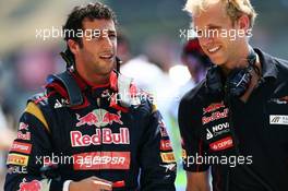 (L to R): Daniel Ricciardo (AUS) Scuderia Toro Rosso with Stuart Smith (AUS) Scuderia Toro Rosso Physio. 27.07.2013. Formula 1 World Championship, Rd 10, Hungarian Grand Prix, Budapest, Hungary, Qualifying Day