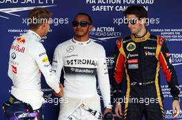 The top three qualifiers in Parc Ferme (L to R): Sebastian Vettel (GER) Red Bull Racing, second; Lewis Hamilton (GBR) Mercedes AMG F1, pole position; Romain Grosjean (FRA) Lotus F1 Team, third. 27.07.2013. Formula 1 World Championship, Rd 10, Hungarian Grand Prix, Budapest, Hungary, Qualifying Day