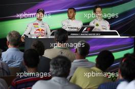 The FIA Press Conference (L to R): Sebastian Vettel (GER) Red Bull Racing, second; Lewis Hamilton (GBR) Mercedes AMG F1, pole position; Romain Grosjean (FRA) Lotus F1 Team, third.. 27.07.2013. Formula 1 World Championship, Rd 10, Hungarian Grand Prix, Budapest, Hungary, Qualifying Day