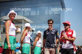 (L to R): Mark Webber (AUS) Red Bull Racing and Fernando Alonso (ESP) Ferrari on the drivers parade. 28.07.2013. Formula 1 World Championship, Rd 10, Hungarian Grand Prix, Budapest, Hungary, Race Day