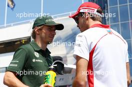 (L to R): Charles Pic (FRA) Caterham with Jules Bianchi (FRA) Marussia F1 Team on the drivers parade. 28.07.2013. Formula 1 World Championship, Rd 10, Hungarian Grand Prix, Budapest, Hungary, Race Day