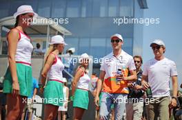 (L to R): Adrian Sutil (GER) Sahara Force India F1 and Nico Rosberg (GER) Mercedes AMG F1 on the drivers parade. 28.07.2013. Formula 1 World Championship, Rd 10, Hungarian Grand Prix, Budapest, Hungary, Race Day