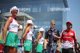 (L to R): Sebastian Vettel (GER) Red Bull Racing and Felipe Massa (BRA) Ferrari on the drivers parade. 28.07.2013. Formula 1 World Championship, Rd 10, Hungarian Grand Prix, Budapest, Hungary, Race Day