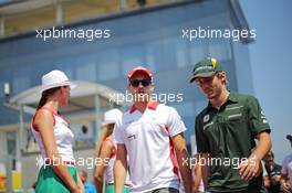 (L to R): Jules Bianchi (FRA) Marussia F1 Team and Charles Pic (FRA) Caterham on the drivers parade. 28.07.2013. Formula 1 World Championship, Rd 10, Hungarian Grand Prix, Budapest, Hungary, Race Day