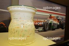 A ceramic wheel rim, signed by the team, to celebrate 100 GP starts for Adrian Sutil (GER) Sahara Force India F1. 28.07.2013. Formula 1 World Championship, Rd 10, Hungarian Grand Prix, Budapest, Hungary, Race Day