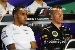 (L to R): Lewis Hamilton (GBR) Mercedes AMG F1 and Kimi Raikkonen (FIN) Lotus F1 Team in the FIA Press Conference. 25.07.2013. Formula 1 World Championship, Rd 10, Hungarian Grand Prix, Budapest, Hungary, Preparation Day