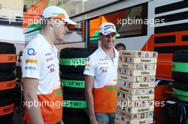 (L to R): Paul di Resta (GBR) Sahara Force India F1 and team mate Adrian Sutil (GER) Sahara Force India F1 play the Sky Sports F1 Horse Power Tower. 25.07.2013. Formula 1 World Championship, Rd 10, Hungarian Grand Prix, Budapest, Hungary, Preparation Day