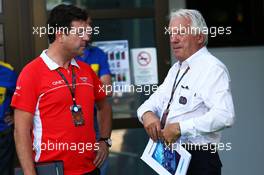 (L to R): Dave O'Neill (GBR) Marussia F1 Team Manager with Charlie Whiting (GBR) FIA Delegate. 25.07.2013. Formula 1 World Championship, Rd 10, Hungarian Grand Prix, Budapest, Hungary, Preparation Day