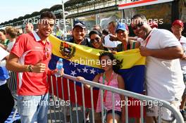 Rodolfo Gonzalez (VEN) Marussia F1 Team Reserve Driver with fans. 25.07.2013. Formula 1 World Championship, Rd 10, Hungarian Grand Prix, Budapest, Hungary, Preparation Day