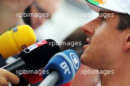 Adrian Sutil (GER) Sahara Force India F1 with the media. 25.07.2013. Formula 1 World Championship, Rd 10, Hungarian Grand Prix, Budapest, Hungary, Preparation Day