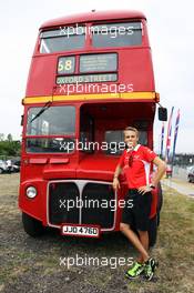 Max Chilton (GBR) Marussia F1 Team with a Routemaster Bus as part of a UK Trade and Investment initiative promoting British Business in Eastern Europe. 25.07.2013. Formula 1 World Championship, Rd 10, Hungarian Grand Prix, Budapest, Hungary, Preparation Day