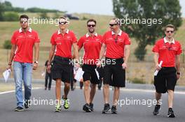 Max Chilton (GBR) Marussia F1 Team and Rodolfo Gonzalez (VEN) Marussia F1 Team Reserve Driver walk the circuit. 25.07.2013. Formula 1 World Championship, Rd 10, Hungarian Grand Prix, Budapest, Hungary, Preparation Day