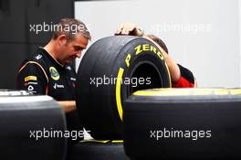 Lotus F1 Team mechanics with Pirelli tyres. 25.07.2013. Formula 1 World Championship, Rd 10, Hungarian Grand Prix, Budapest, Hungary, Preparation Day