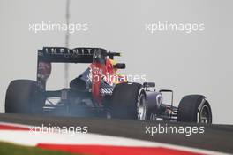 Mark Webber (AUS) Red Bull Racing RB9 locks up under braking. 25.10.2013. Formula 1 World Championship, Rd 16, Indian Grand Prix, New Delhi, India, Practice Day.