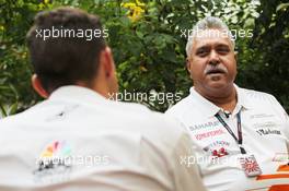 Dr. Vijay Mallya (IND) Sahara Force India F1 Team Owner interviewed by Will Buxton (GBR) NBS Sports Network TV Presenter. 25.10.2013. Formula 1 World Championship, Rd 16, Indian Grand Prix, New Delhi, India, Practice Day.